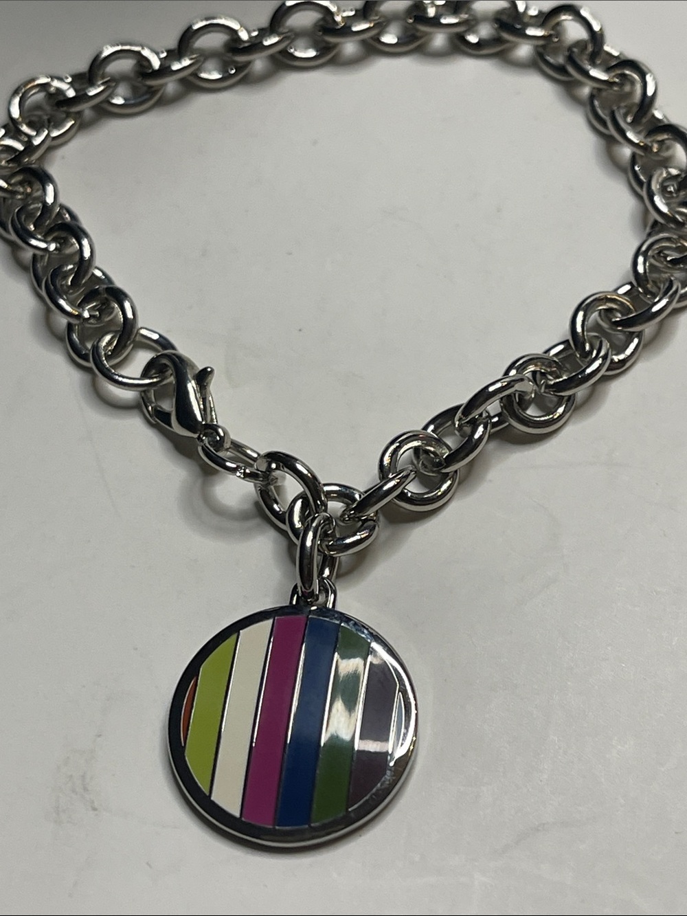 Coach Legacy Silver Chain Bracelet with Multicolor Enamel Disc Charm